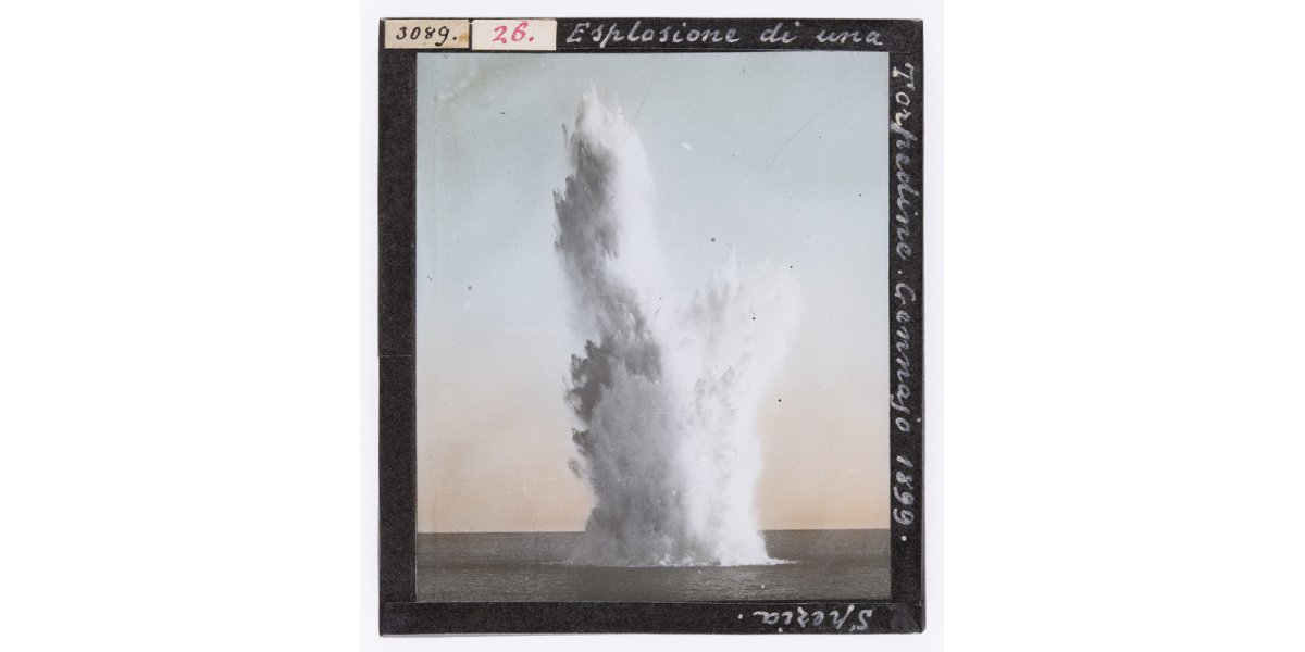 Unknown author, “Torpedo explosion. January 1899. Spezia”, Jan. 1899, hand-coloured glass slide, Alinari Archives-Roster archive, Florence