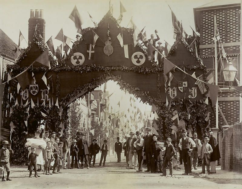 Unknown author, A street decorated with flags and garlands for Queen Victoria’s visit during the Golden Jubilee celebrations, Newport, Great Britain, 22nd July 1887, albumen print, Alinari Archives, Florence