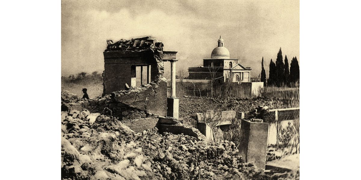 Frank Alvord Perret, Lava near the Torre Annunziata cemetery, Solidified lava blocks the passage under a bridge, 1906, collotype, 18x23 cm, from the album "Vesuvio" dedicated to RV Matteucci director of the Royal Vesuvian Observatory, Alinari Archives-album collection, Florence