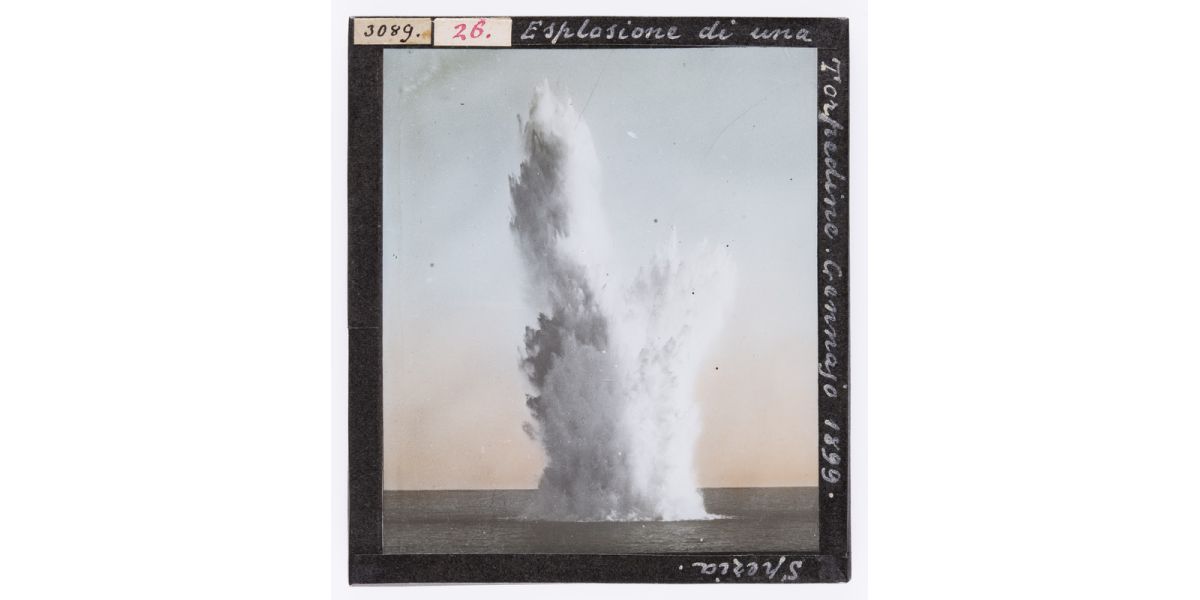 Unknown author, “Torpedo explosion. January 1899. Spezia”, Jan. 1899, hand-coloured glass slide, Alinari Archives-Roster archive, Florence