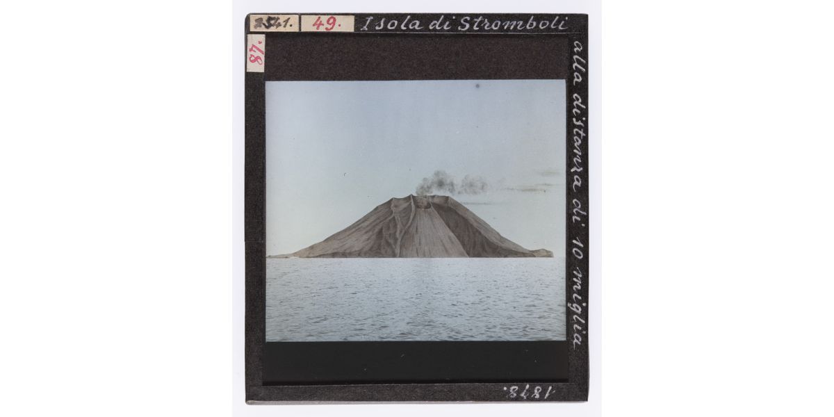 Giorgio Roster, View of the Island of Stromboli photographed from a distance of ten miles, Aeolian Islands, 1878, hand-coloured glass slide, 9 x 8 cm, Alinari Archives-Roster archive, Florence