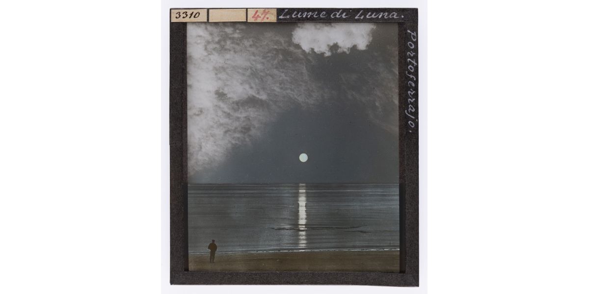 Giorgio Roster, The moon over the sea of Portoferraio, Elba Island, 1890-1910, hand-coloured glass slide, 8 x 9 cm, Alinari Archives, Roster archive, Florence