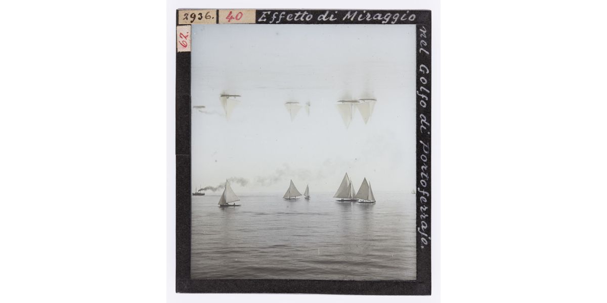 Giorgio Roster, "Mirage effect in the Gulf of Portoferraio", Elba Island, 1895-1898 ca., hand-coloured glass slide, 8 x 9 cm, Alinari Archives, Roster archive, Florence